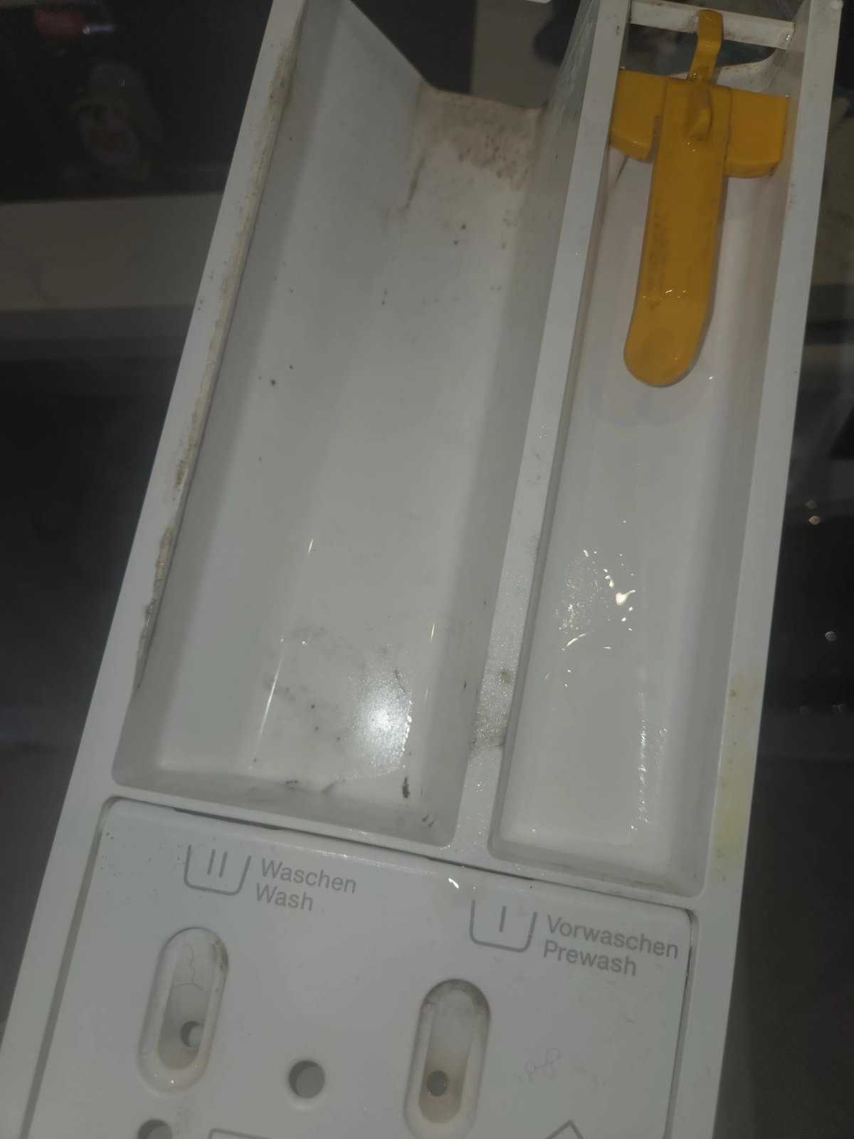 Miele washing machine detergent drawer before cleaning